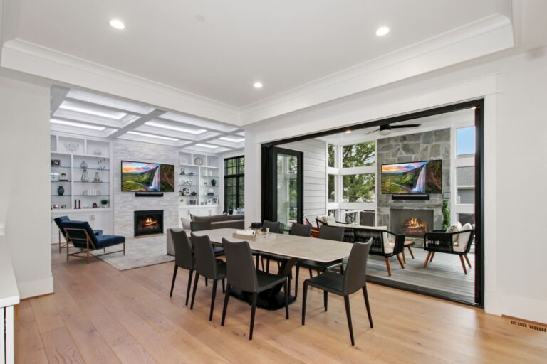 Granada indoor dining room with large glass doors to outdoor covered patio